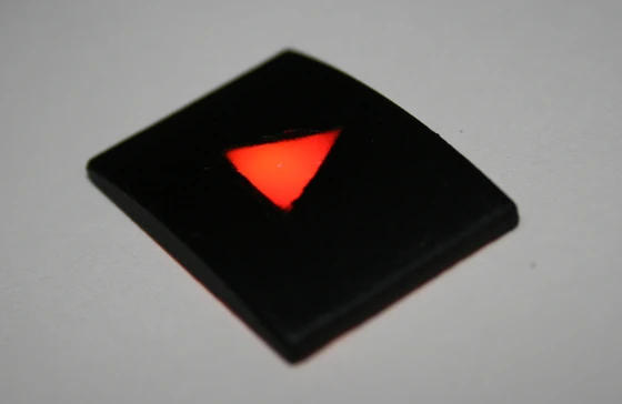 Translucent material painted and paper etched — with backlight on — Stratnel