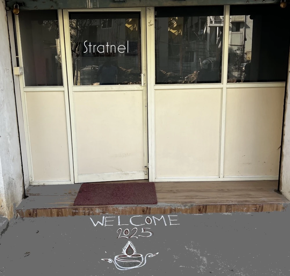 Welcome 2025 Rangoli at Stratnel entrance